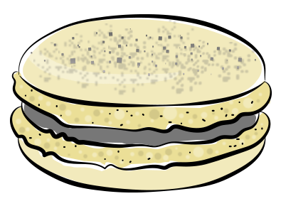 Pale macaron shell dusted with cookie crumbs with a chocolate ganache filling.