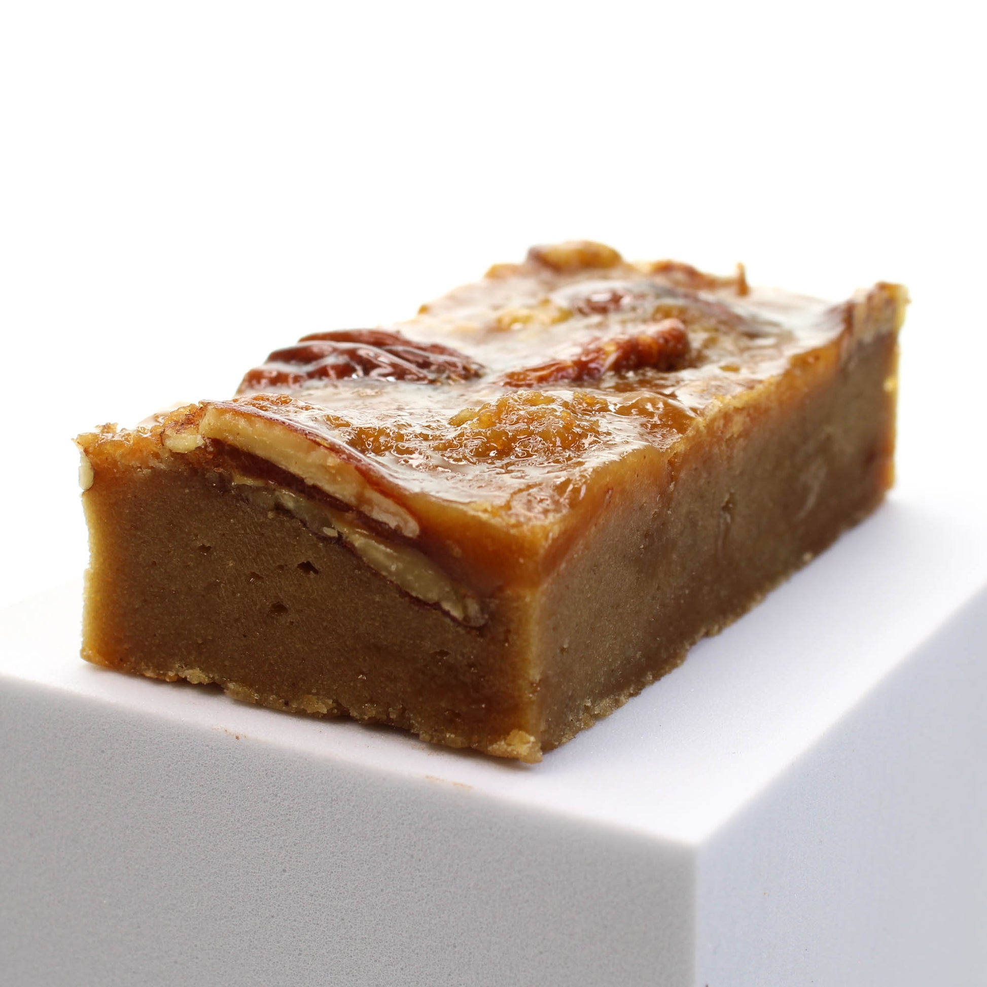Pecan Pie Blondie showing off the oozy caramel texture. Choose this homemade bar for your brownie gift box.