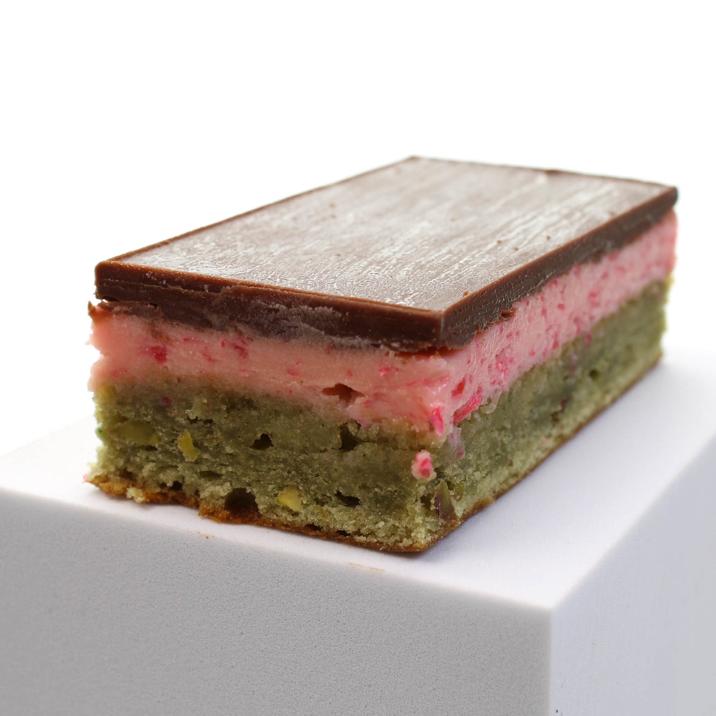 Spumoni bar showing three distinct layers. Choose this homemade cake bar for your chocolate gift box.