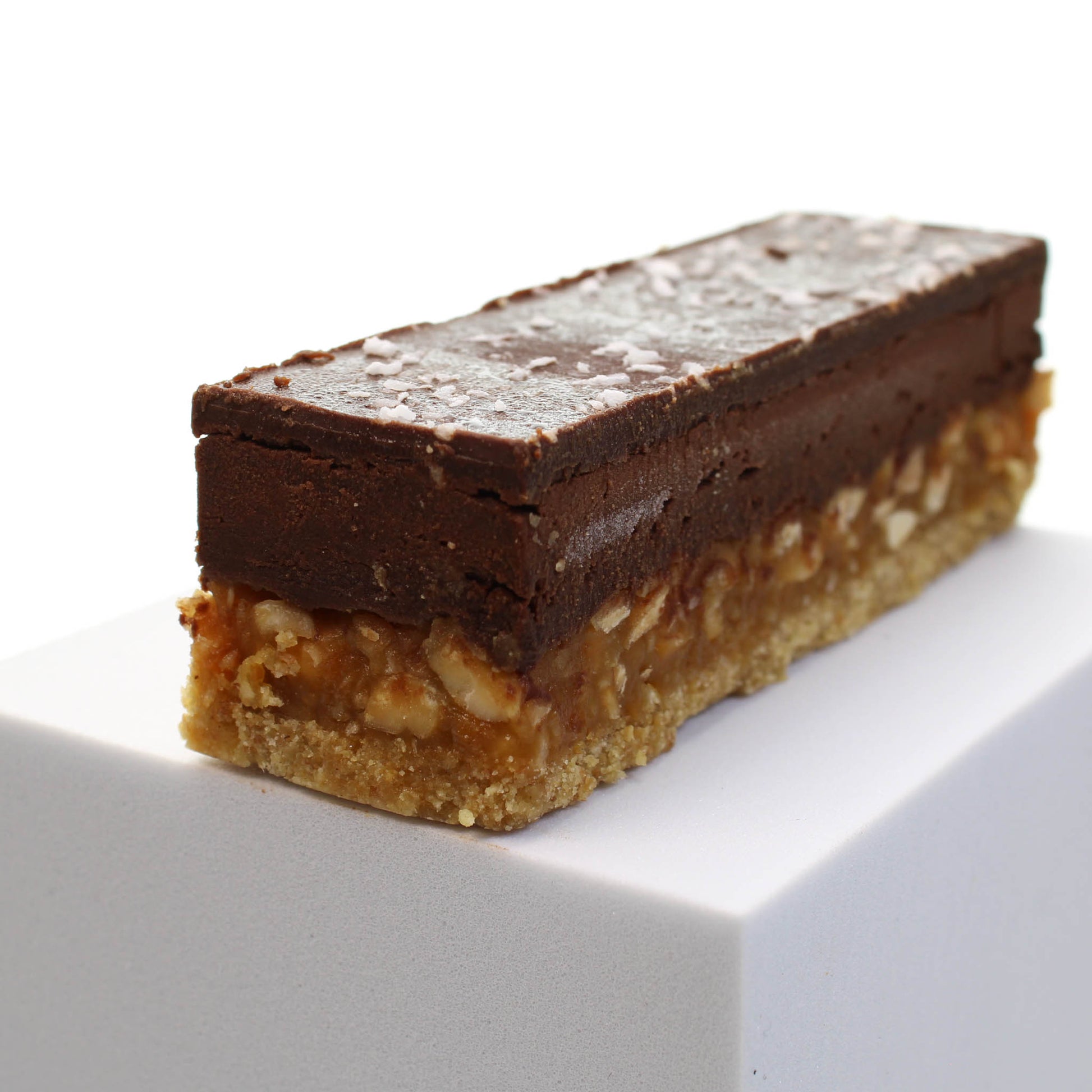 Cococabana bar showing four distinct layers. Choose this homemade chocolate bar for your chocolate gift box.