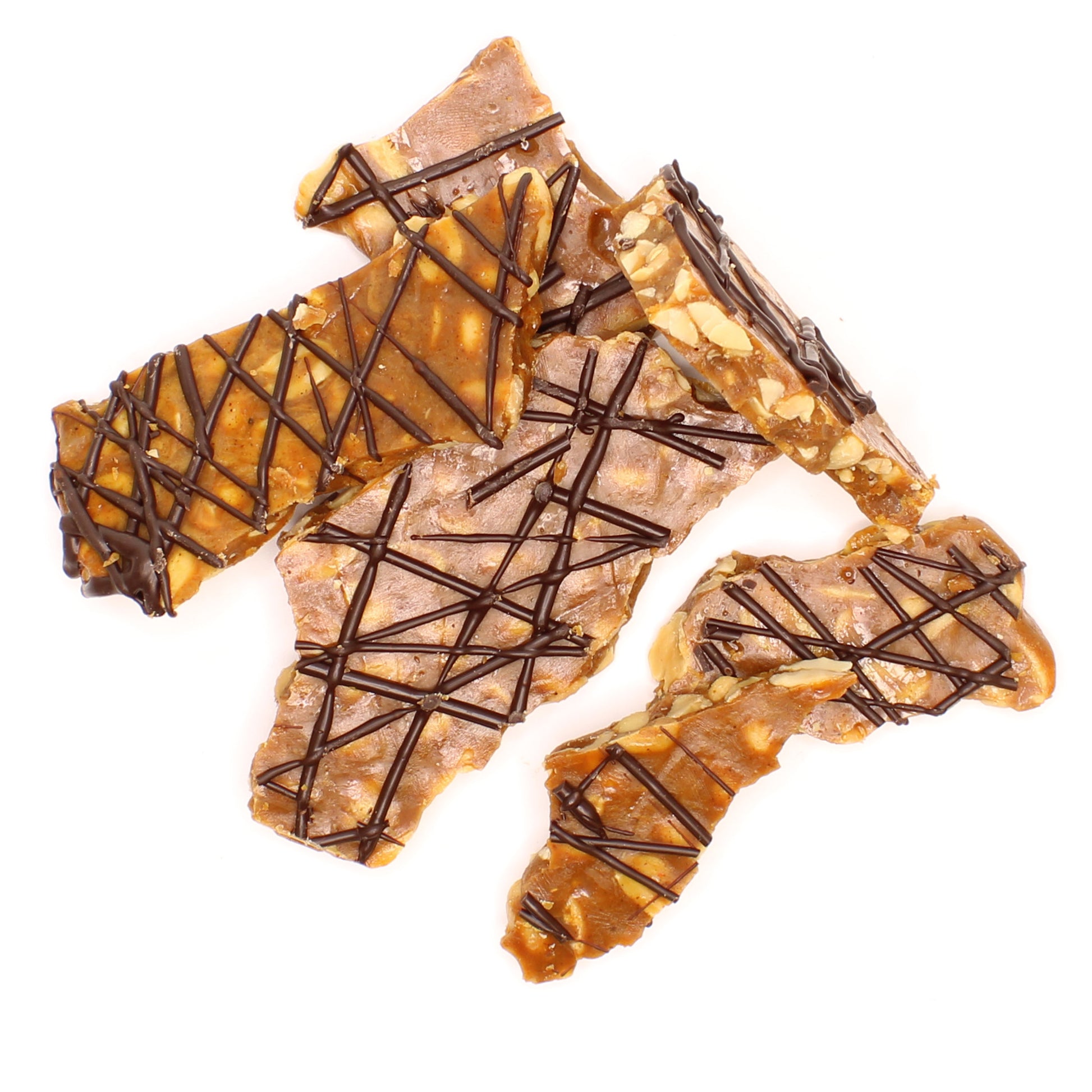 Spiced Peanut Brittle drizzled with chocolate and broken into pieces. 