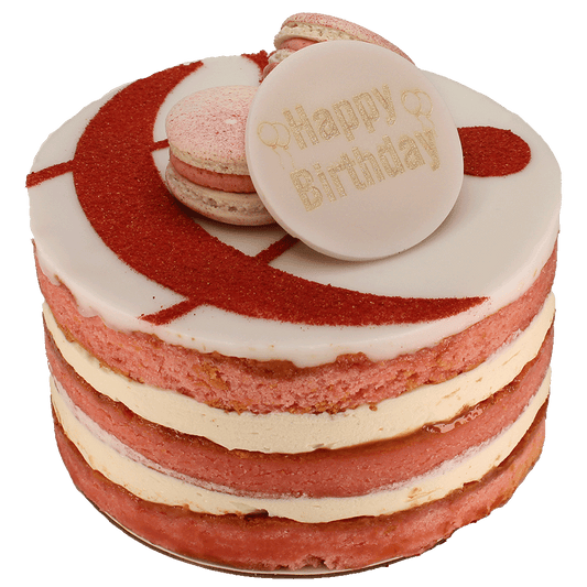 A Strawberries & Cream cake with multiple layers, toped with icing, macarons and a curly ampersand design and a 'Happy Birthday' plaque.