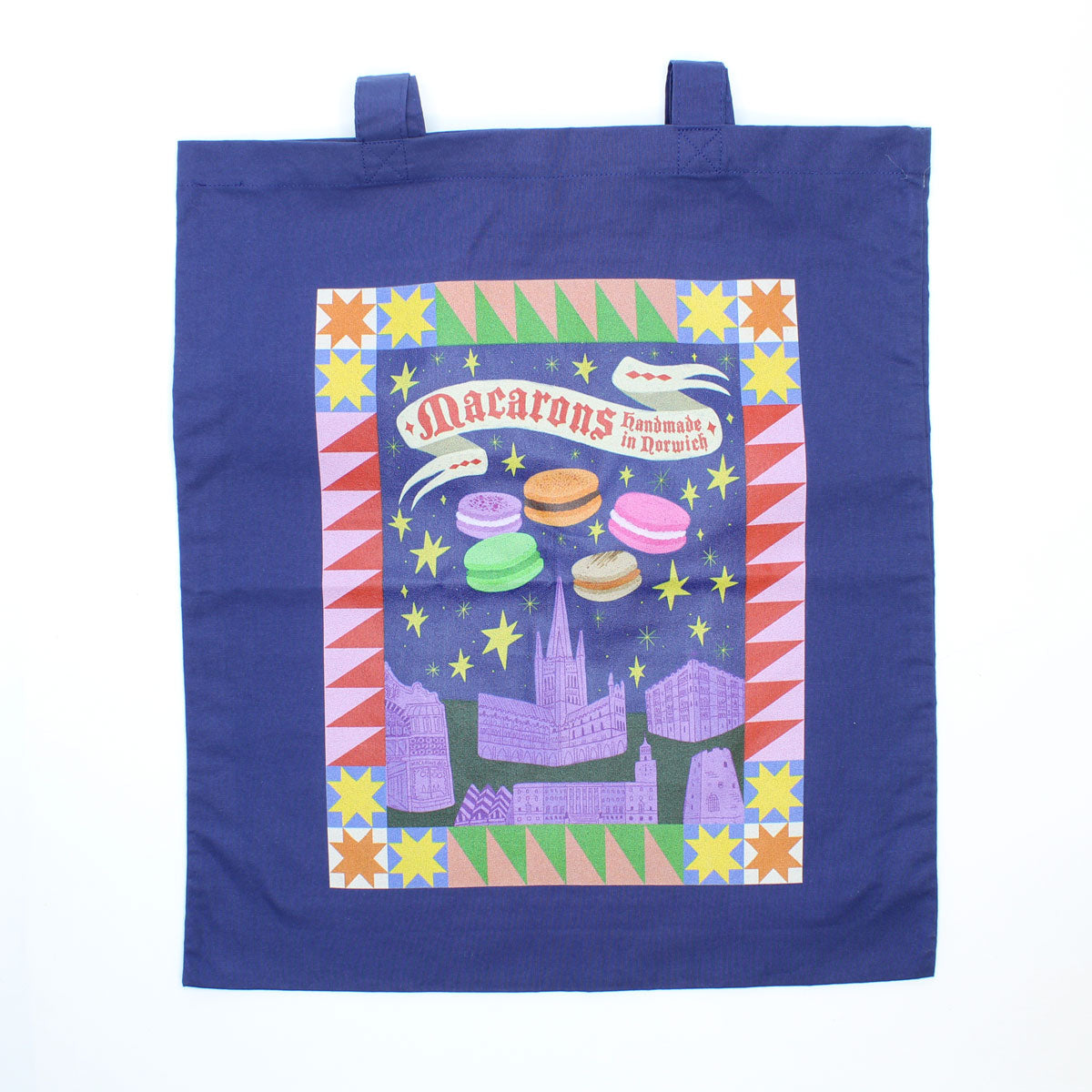 Blue tote bag with colourful graphic design on a white background