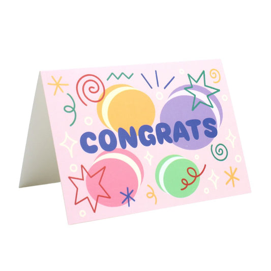 Colourful card with 'Congrats' text with macaron illustrations and stars and swirls